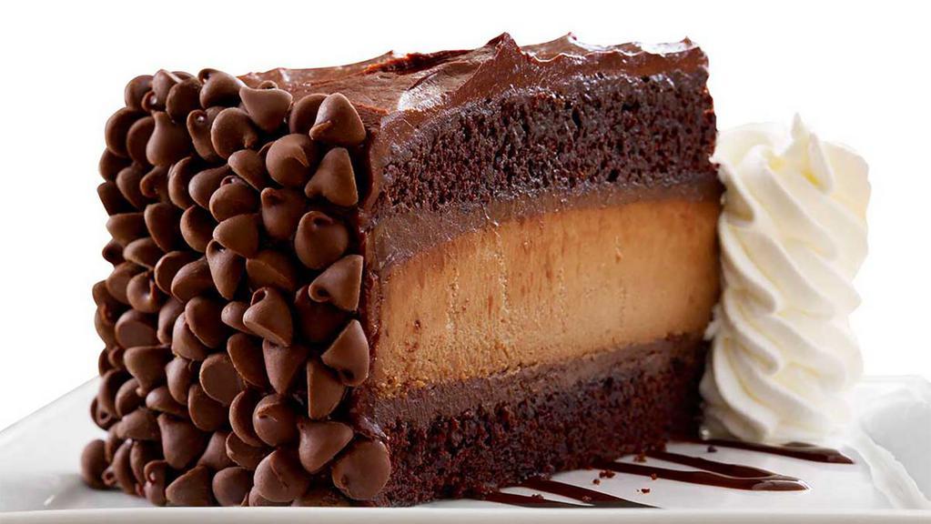 Hershey'S® Chocolate Bar Cheesecake · Hershey's Cheesecake Between Moist Chocolate Cake with Creamy Chocolate Frosting and Chocolate Chips