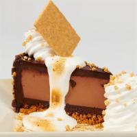 Toasted Marshmallow S'Mores Galore™ · Hershey’s® Cheesecake Topped with Housemade Marshmallow and Honey Maid® Graham Crackers