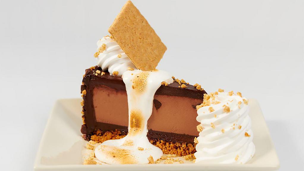 Toasted Marshmallow S'Mores Galore™ Cheesecake · Hershey’s® Cheesecake Topped with Housemade Marshmallow and Honey Maid® Graham Crackers