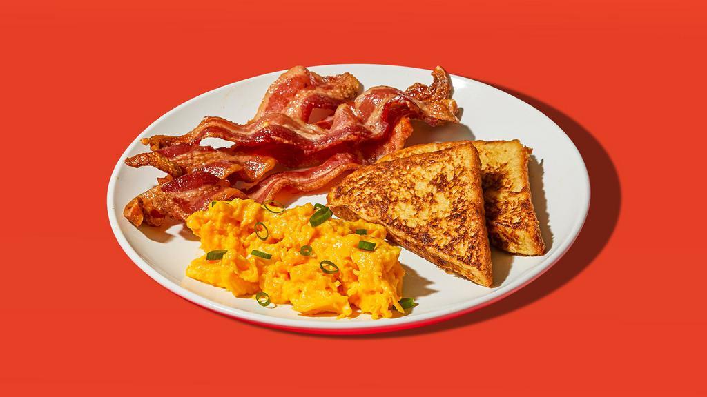 French Toast Platter · Four half slices of egg-washed french toast served with two eggs and your choice of breakfast meat.