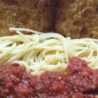 Spaghetti · with our own hearty meat marinara sauce.