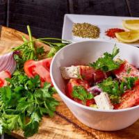 Greek Salad · Tomatoes, Onions, Cucumbers, Olives, Feta Cheese, Bell Peppers, Lemon Dressing, Maras Pepper