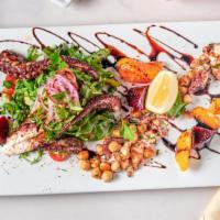 Grilled Octopus Salad · Arugula, Garbanzo Beans, Beets, Orange Segments, Apples, Cherry Tomatoes, Apple Basil Vinaig...
