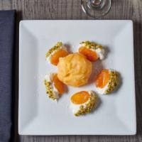 Stuffed Turkish Apricots · Chardonnay Poached Apricots Stuffed with Mascarpone and Cream Cheese, Rolled in Pistachios