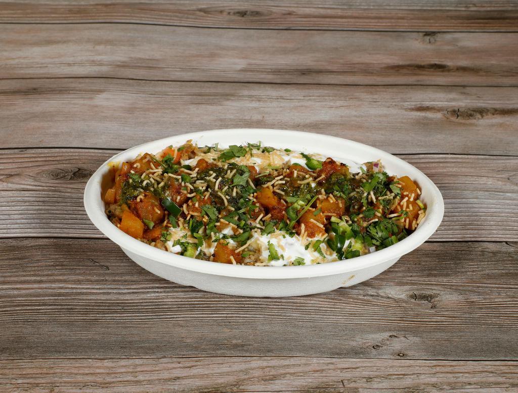 Vegetable Rice Chaat · Savor the flavors with our Vegetable Chaat with our Chutneys!