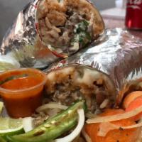 Burrito · Choice of meat,rice,beans,onion,cilantro,hotsauce