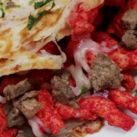 Quesadilla Loca · Choice of meat, cheese,onion,cilantro,hot chips