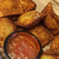 3. Toasted Ravioli (10) · Your choice of meat or cheese filled. Served with marinara sauce.