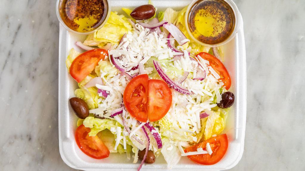 6. Greek Salad · Romaine lettuce, tomatoes, cucumbers, red onions, kalamata olives, and feta chees with our champagne vinaigrette dressing.