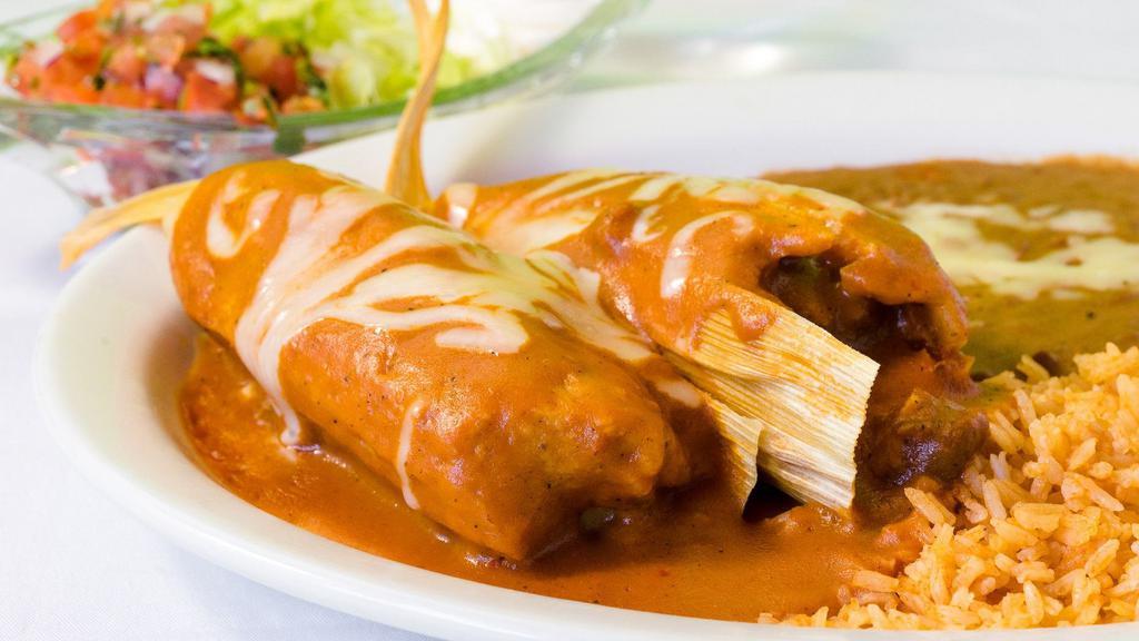 Two Chicken or Pork Tamales · Served with rice, refried beans, lettuce, pico de gallo and sour cream.