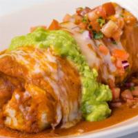 Wet Burrito · Choice of meat, rice, refried beans, topped with red or green sauce, Pico de Gallo, sour cre...