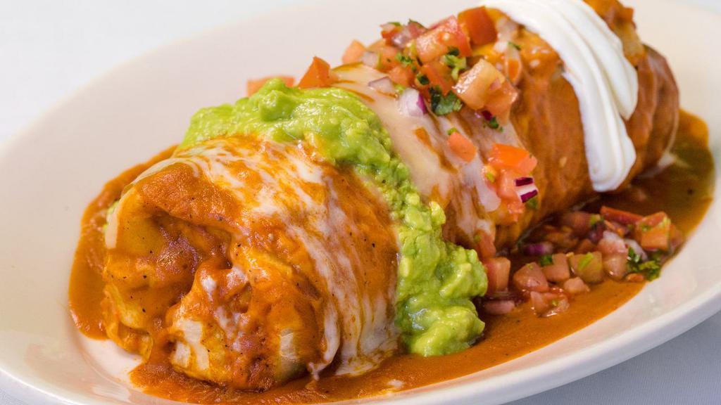 Wet Burrito · Choice of meat, rice, refried beans, topped with red or green sauce, Pico de Gallo, sour cream and guacamole.