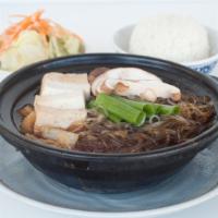 Sukiyaki · Beef & Chicken. Noodles, Vegetables & Tofu Cooked in a Soy Sauce Base.