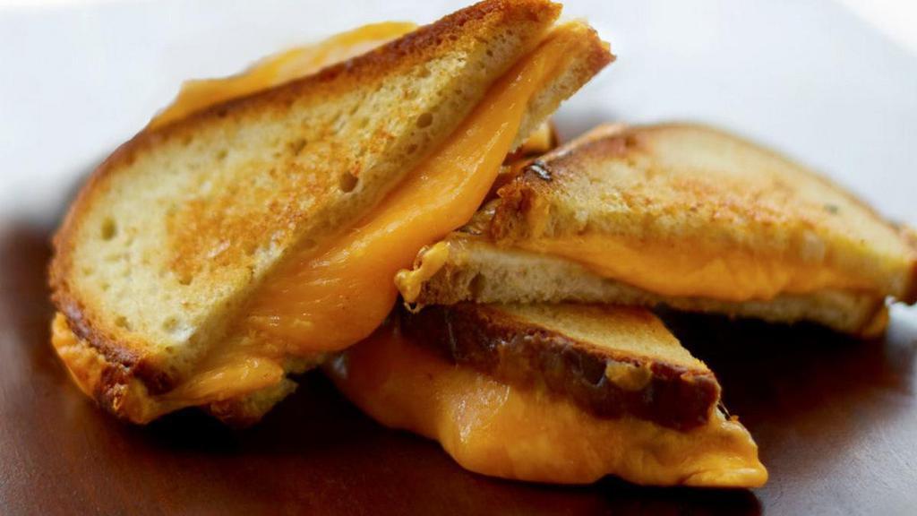 Grilled Cheese Trifecta · tillamook cheddar • provolone • american • griddled sourdough • add applewood smoked bacon option