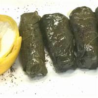 Dolma · Grape leaves stuffed with rice and assorted herbs and spices.