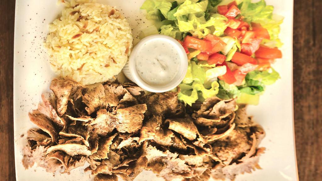 Lamb Beef Gyros · Slaw-cooked, thinly sliced, marinated lamb and beef.