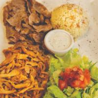 Combo Gyros · Slaw cooked, thinly sliced marinated chicken gyro and lamb-beef gyros.