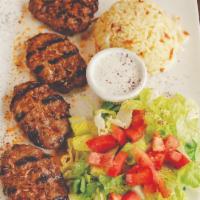Kofte Kebab · Char grilled minced lamb  and beef  with  parsley, veggies and spices.