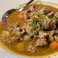 Lamb Stew · Lamb, potatoes, carrots, onions and turnips topped with fresh parsley.