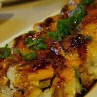 Baked Scallop · Baked. In: crab mix, avocado. Out: scallop, green onion, tobiko. Sauce: creamy parmesan sauc...
