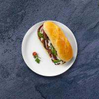 Philly Steak Sandwich  · Sauteed with mushrooms, onions, bell peppers and cheese.