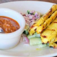 Chicken Satay · Marinated chicken grilled on skewers, served with sides of peanuts sauceand cucumber salad. ...