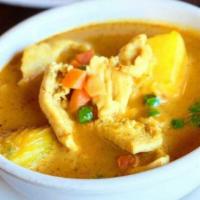 Yellow Curry · Potatoes, carrots and peas simmered in a mild yellow curry sauce.