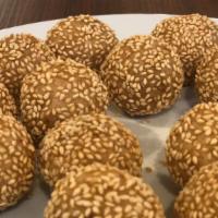 Sesame Balls · 4 pcs per order.
It's fried Chinese pastry made from glutinous rice flour. The pastry is fil...