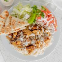 Chicken Plate · Served with Basmati rice, salad, pita bread, and tzatziki sauce