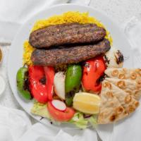 Koobideh (Ground Beef) · Served with Basmati rice, salad, Naan Bread, and chutney