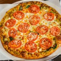 Pesto Paradise Pizza · Pesto sauce, spinach, chicken, fresh tomatoes.