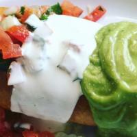 Chimichanga · Meat, rice, beans,pico de gallo, guacamole, lettuce sour cream and cheese. Deep fried burrito.