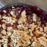 Mango Raspberry Crisp · Mangos, brown sugar and tart raspberries are topped with a buttery crumble for this tropical...