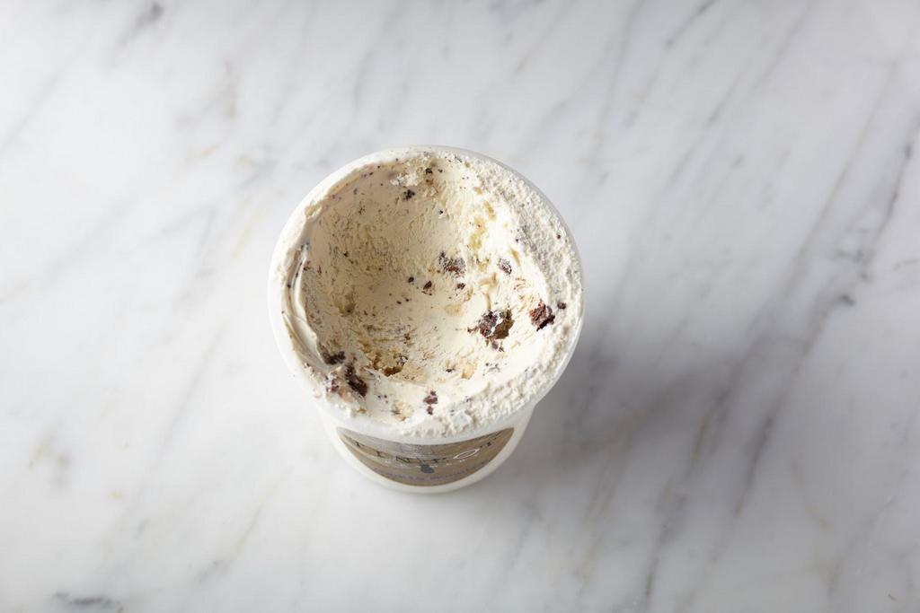 Cookie Monster Pint · Organic sweet cream ice cream layered with house-made eggless cookie dough and black magic cookies.
