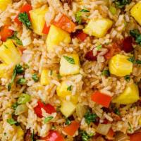 PINAPPLE FRIED RICE (24 oz) · Fried rice with Garlic, Mixed Vegetables, Onions, Carrots, Cabbage and Pineapple.