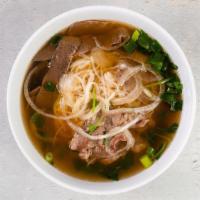 Pho Tai & Chin Nam · Rice noodles, signature beef broth with thinly sliced steak and brisket. Gluten-Free. Conati...