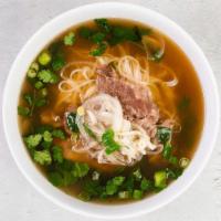 Pho Tai · Rice noodles, signature beef broth with thinly sliced steak. Gluten-Free. Conatins fish. We ...