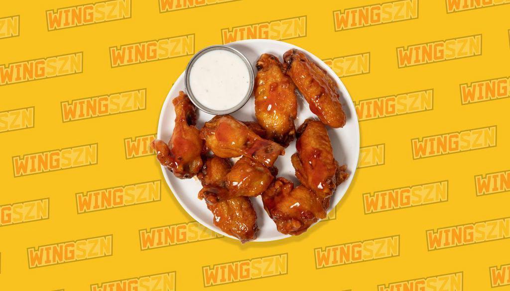 Sweet Honey Heat · The perfect balance of sweet and heat - fresh honey and sweet strawberry preserves meets crushed red pepper, garlic, tossed with our classic, bone-in chicken wings.