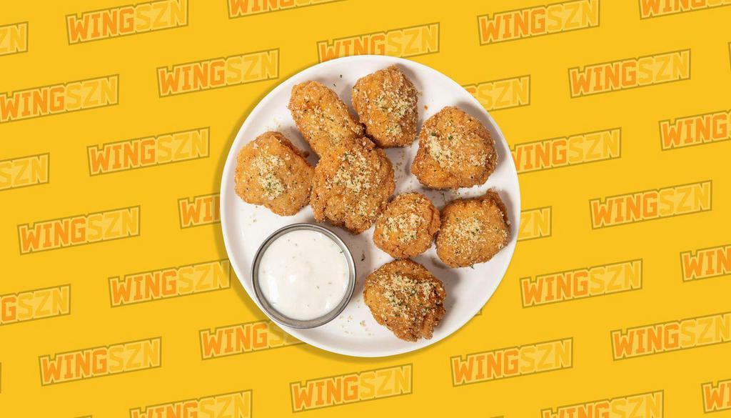 Crispy Garlic Parmesan · The ultimate crowd pleaser. Savory garlic, rich cheesy parmesan, a touch of kosher salt, tossed with our 100% white-meat boneless chicken wings. This dry rub hits different
