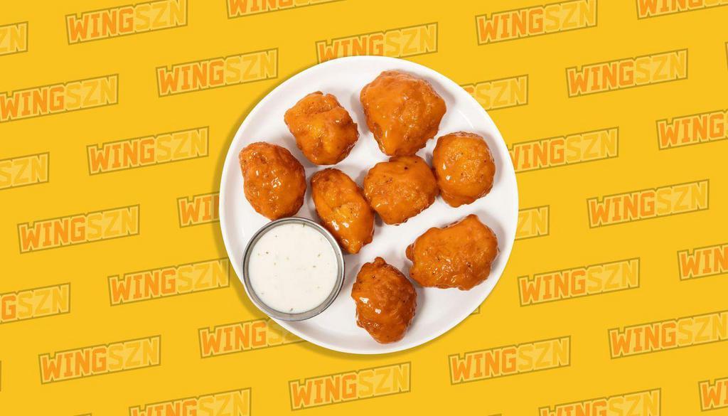 Blazin’ Orange Soda · Our signature blend of real orange soda, orange zest, red pepper, and just a touch of hot sauce, tossed with our 100% white-meat boneless chicken wings. Sticky, sweet, & mind-bogglingly delicious.
