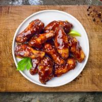 Best In BBQ Wings  · Fresh chicken wings breaded, fried until golden brown, and tossed in barbecue sauce. Served ...