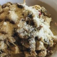 Cappellini Con IL Pollo · Cappelini pasta with chicken, porcini mushrooms, capers, sun-dried tomato in a light cream s...
