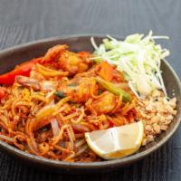 Burma House Noodle  · Rice noodle with red bell peppers, onions, cabbage and egg, with crushed peanuts and lemon o...