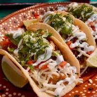 Super Taco(homemade tortillas) · Choice of meat, cilantro,  avocado, sour cream, pico de gallo, and cheese.