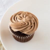 Chocolate Cupcake with chocolate buttercream bagged icing · 