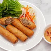 #3 Fried Egg Rolls · Crispy fried egg rolls with the combination of pork and shrimp, served with pickled carrots ...