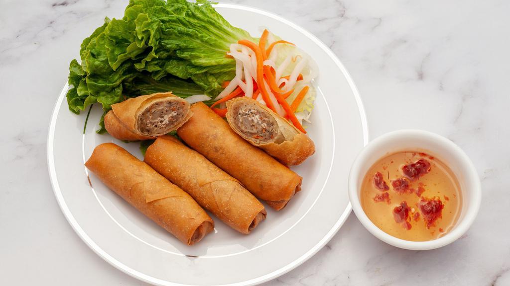 #3 Fried Egg Rolls · Crispy fried egg rolls with the combination of pork and shrimp, served with pickled carrots and dipping sauce
