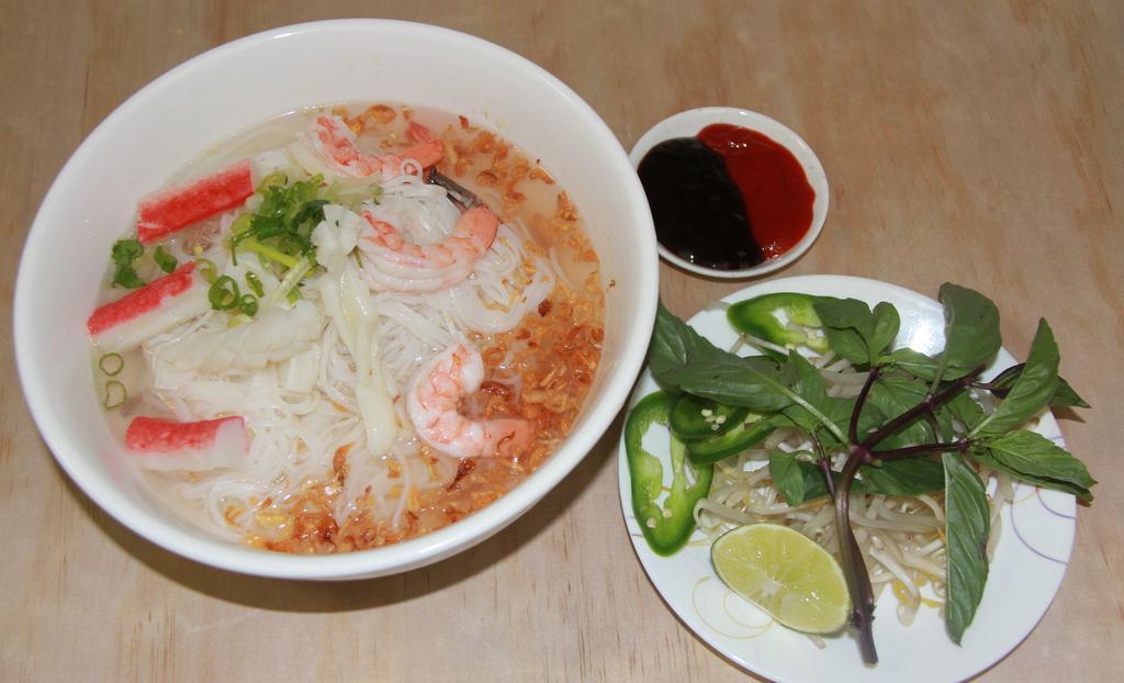 #40 L Seafood Combination with Rice Noodle · Shrimps, imitation crab, squids and fried onions