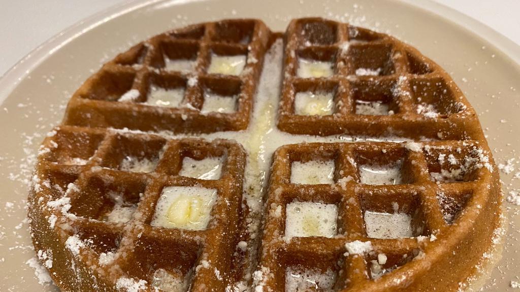 Belgian Waffle · Homemade Belgian waffle with butter and powdered sugar.