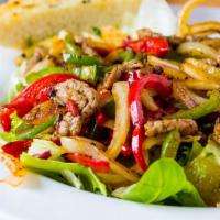 Fajita Salad · choice of beef or chicken, bell pepper, poblano pepper, corn, red onion, crispy blue tortill...